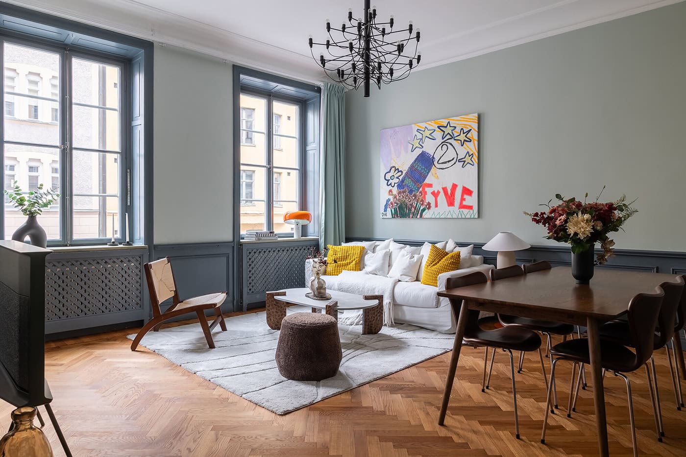 Blue wainscoting and blue walls in a gorgeous historic apartment