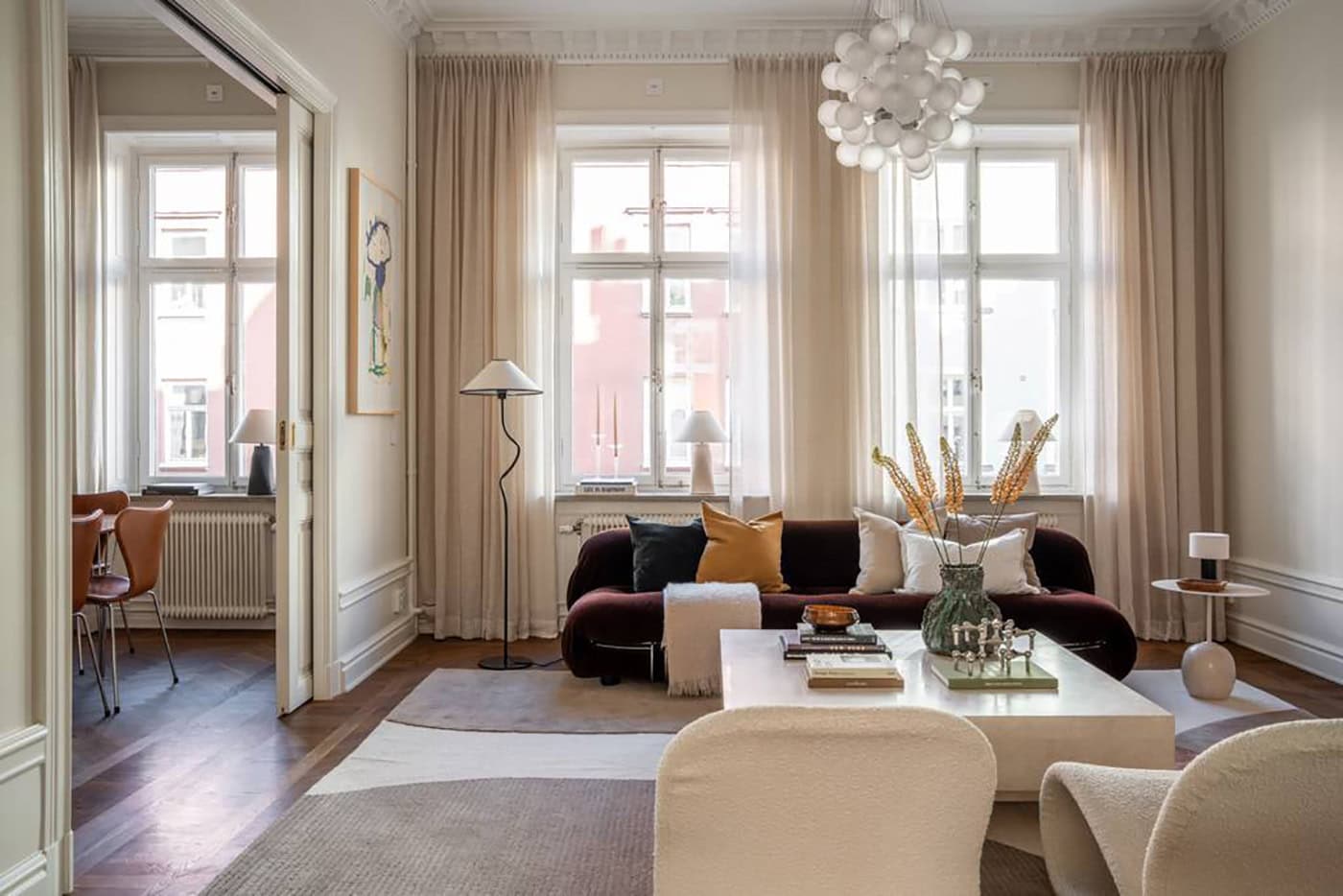 A high-end historic flat with custom built-ins and design classics